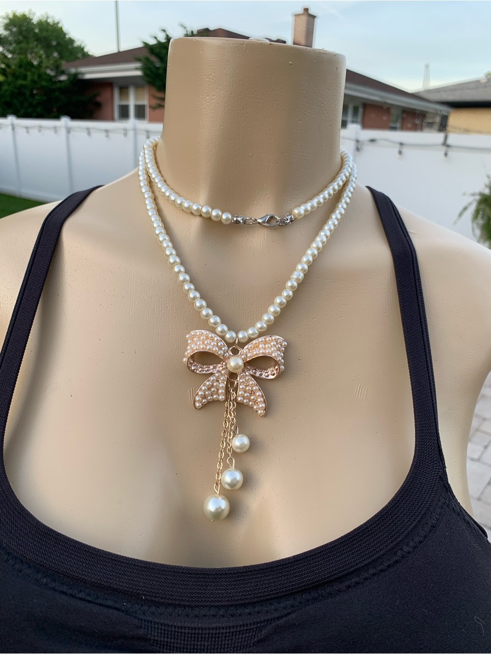 BOW PENDANT PEARL NECKLACE